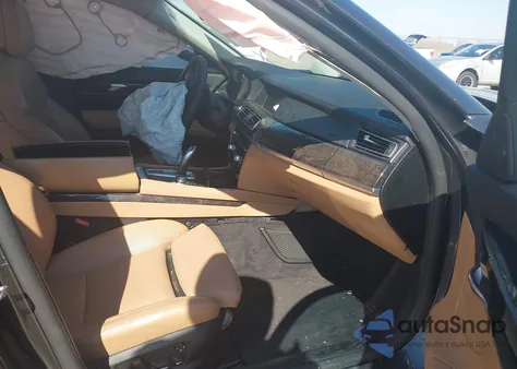 2011 BMW 750Li z USA, uszkodzony, nr VIN WBAKB8C52BCY66290